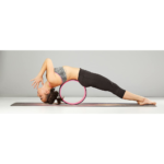 Frau auf Yoga Rad, Schwarz, Pink